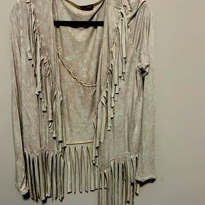 Fringe jacket is fun and lightweight.  Great with black t. Never worn